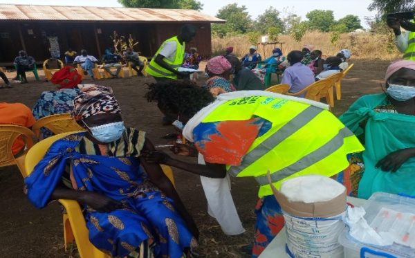 ©CHD/Pochalla – 003/Abuy Odol Omai, a women leader from Lokri Boma, receives her booster dose. Abuy was very excited to receive the booster dose and stated that, ‘’all mothers should receive the vaccine, all the negative rumors about the vaccine have ended, let the campaign continue, covering the population in greater Pochalla’.
